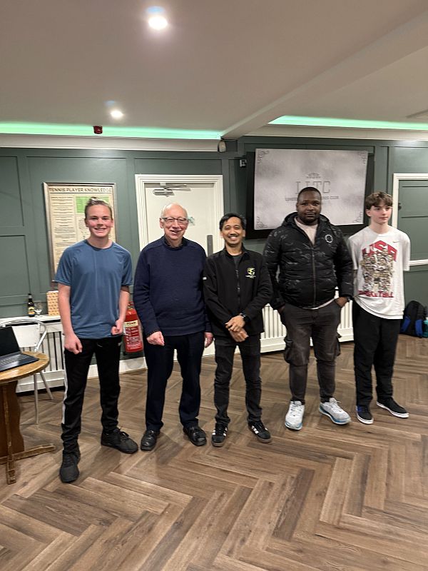 The four joint 1st prize winners in the Limerick Xmas blitz 2025 on 5/6 points, with tournament Controller Ray O'Brien(second